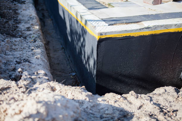 Professional Interior Drainage System technician working in Riley, IN